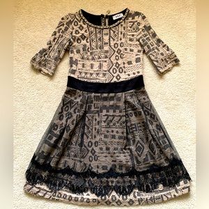 Dress with lace and golden necklace with clear stones accent. US size S.
